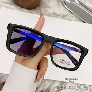 Detail of matte black square sunglasses with blue light coating and photochromic lenses