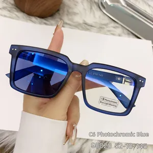 Detail of matte blue photochromic glasses frame showing the 52-18-145 size specifications