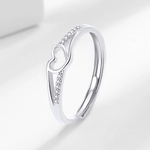 Modern silver heart ring with sparkling cubic zirconia in an adjustable open design