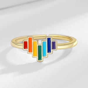 Adjustable gold open ring featuring a vibrant rainbow enamel heart in pixelated style