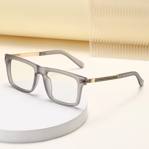 2025 square photochromic sunglasses with matte grey frame and gold metal temples
