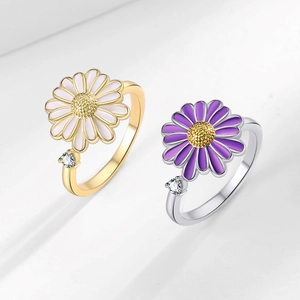 Rotating daisy fidget rings in gold and silver finish with zircon and enamel petals