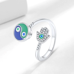 Adjustable silver ring with colorful enamel Yin Yang symbol and crystal Hamsa Hand detail
