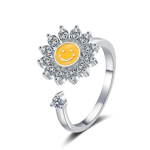 Adjustable silver spinner ring featuring a sunflower zircon smile face to relieve anxiety