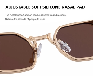 Detail of adjustable soft silicone nasal pads on gold metal square sunglasses