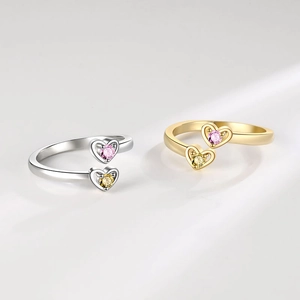 Bagues cœur ouvertes en or et argent avec zircons roses et jaunes au style épuré