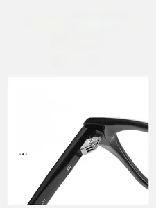 Detail of durable metal hinge on black cat-eye optical frame for women's glasses