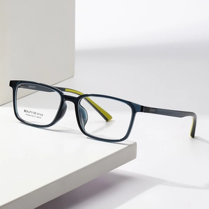 Deep blue translucent square optical frames with yellow accents on white geometric blocks