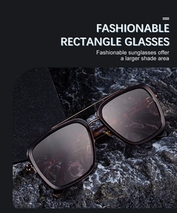 Detailed macro view of square frame sunglasses with metal double bridge and model markings