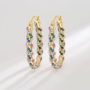 Golden twisted hoop earrings with multi-color zircon stones shown in high-quality view