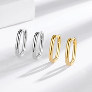 Minimalist 18K gold and silver plated hollow heart hoop earrings in oval geometric style