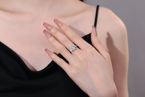 Detailed shot of a spinning helm-shaped silver ring with colorful cubic zirconia