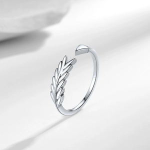 Minimalist silver open ring featuring leaf texture and geometric triangle elements