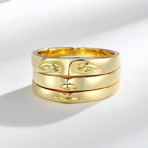 Set of 3 gold-plated stackable face rings with eyes nose and lips minimalist design