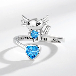Silver axolotl open ring holding blue heart gems with I Love You Forever engraving