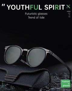 Close-up of polarized oval sunglasses with metal frame on leather case and rock texture