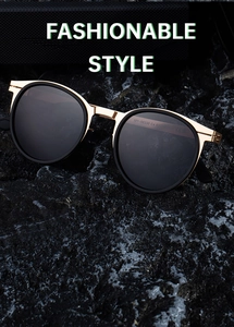Detail view of oval polarized sunglasses with gold metal hinges and model MY-98330 laser mark