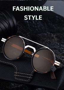 Detail of retro round polarized sunglasses with silver metal double bridge on leather case