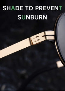 Macro detail of high-quality golden metal hinge and brushed temple on round sunglasses