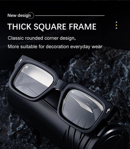 Détail d'une monture de lunettes de soleil carrée épaisse noire avec rivets en flèche