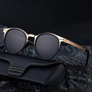 Vintage oval polarized sunglasses for men with black and gold metallic frame and leather case