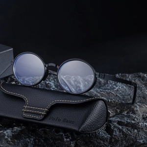 Polarized retro oval sunglasses with black metal frame and premium leather case