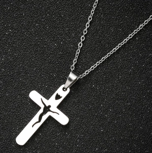 Silver stainless steel cross pendant necklace with heart cutout and Jesus silhouette
