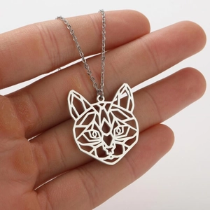 Close-up of a silver hollow geometric cat pendant necklace with fine cable chain