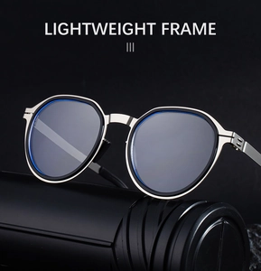 Detailed shot of the lightweight silver metal frame with a black inner ring and blue lenses