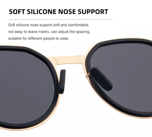 Detail of adjustable soft silicone nose pads on gold frame sunglasses for comfort
