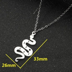Minimalist stainless steel snake pendant necklace with crescent moon cutout, 33mm height
