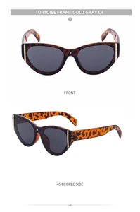 Detail of tortoise frame cat-eye sunglasses with gray lenses and gold accents
