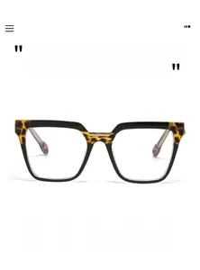 Close-up of cat-eye glasses frame featuring retro tortoiseshell pattern and sleek black trim