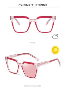 Detail of photochromic cat eye glasses lenses changing from clear to pink in sunlight