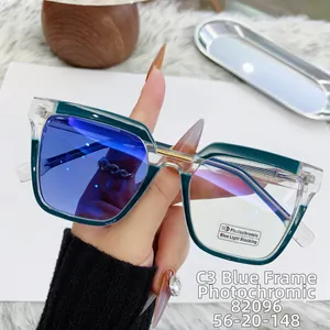 Detailed view of cat eye photochromic glasses with green frame and blue light filter