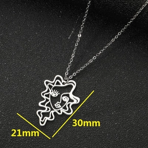 Modern abstract face pendant necklace in stainless steel with 30mm x 21mm dimensions