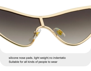 Detail of adjustable silicone nose pads and golden alloy bridge on trendy cat eye sunglasses