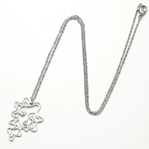 Minimalist stainless steel necklace featuring an abstract art face pendant with lobster clasp
