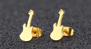 Macro view of detailed golden electric guitar-shaped stud earrings in 18K gold plated steel