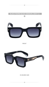 Macro detail of black square sunglasses with gradient gray lenses and carved gold temples