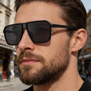 Side view of men's square black polarized sunglasses with metallic bridge details