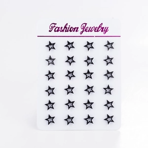Set of 12 pairs of black geometric hollow star stud earrings on a fashion display card