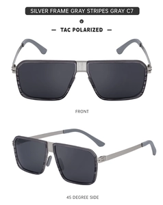 Detail view of square polarized sunglasses with silver metal frame and grey striped accents