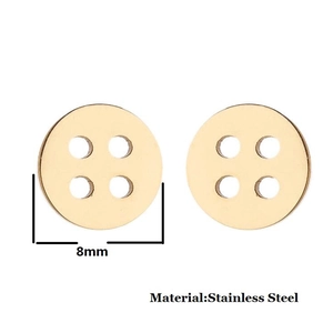 Detail view of 8mm gold button earrings in stainless steel with a four-hole design
