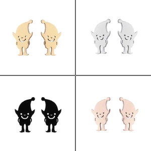 Detail view of clown stud earrings set in gold, silver, black, and rose gold finishes