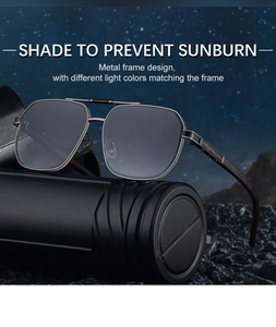 Detail showing pilot-style metal sunglasses on a dark pedestal against a starry night background