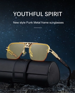 Detail of punk metal sunglasses with yellow lenses and golden bridge logo on leather case