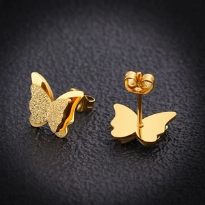 Golden butterfly earrings with dual-layer wings featuring matte and polished finishes