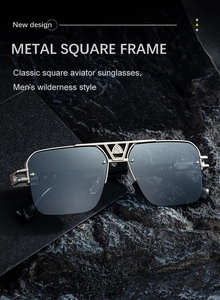 Close-up of semi-rimless aviator sunglasses with metal double bridge on dark rocky texture
