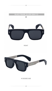 Detail of square sunglasses with silver textured metal temples and green gemstone accent